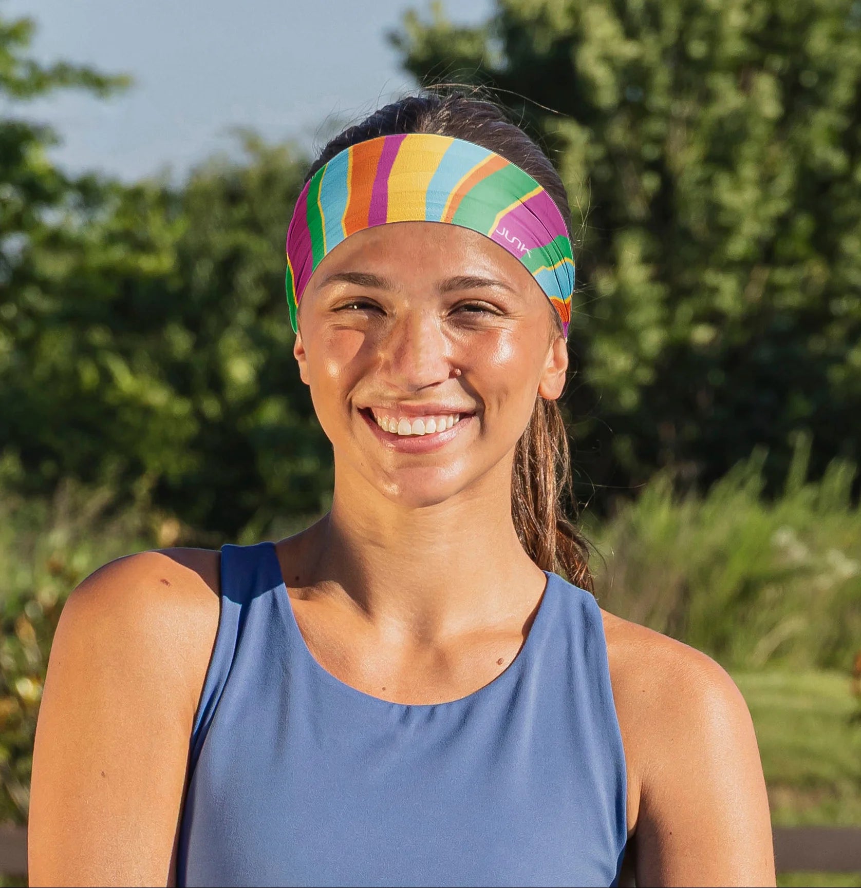 Athlete wearing a colorful performance headband outdoors